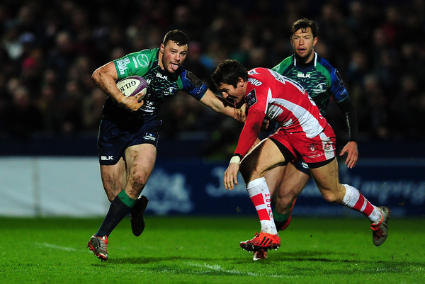 The Ireland and Connacht centre Robbie Henshaw against the Wales and Gloucester fly-half James Hook