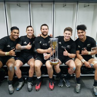the-hurricanes-players-julian-savea-tj-perenara-dane-coles-beauden-barrett-and-ardie-savea-celebrating-with-the-rugby-championship-trophy