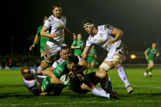 The Connacht fullback Tiernan O'Halloran dives to score a try against Ulster during the 2017-2018 Pro14 season