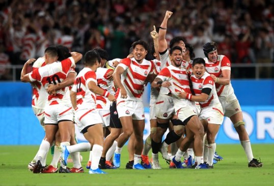 Japan celebrating their historic home win against Ireland during the 2019 World Cup pool game in Shizuoka, Japan